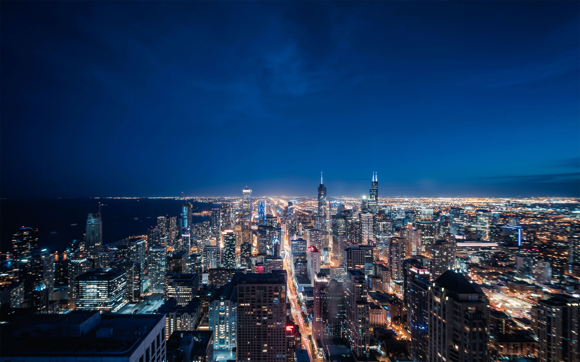 https://ucia-rioz.fr/wp-content/uploads/2021/01/1160442138-Aerial-View-of-Chicago-cityscape-skyline-at-Night-1.jpg